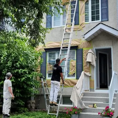 Rénovation extérieure stucco et volets à Blainville, après